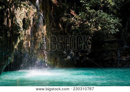 Green Hidden Mini Waterfall In Philippines With Rainbow