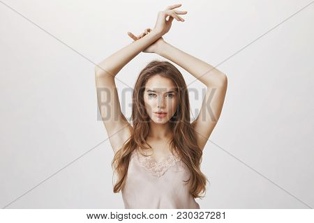 Sophisticated Woman Knows About Her Sexuality. Good-looking European Female Model Standing In Fashio