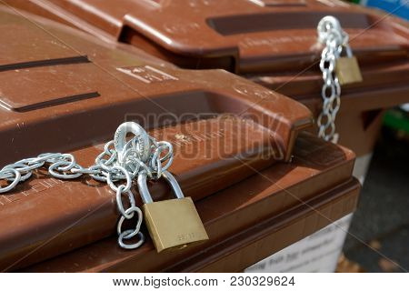 Locked Brown Bio Waste Bins At Rendezvous - Close-up