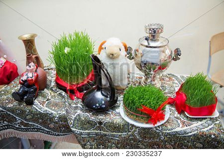Connected With A Red Ribbon Green Semeni . Samovar. Sheep Puppet