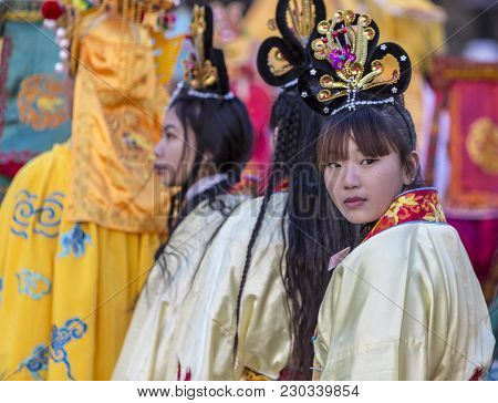 Paris,france-february 25,2018: Environmental Portrait Of An Unidentified Chinese Girl Looking Back D