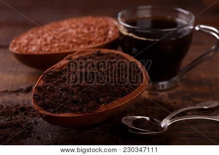 Chocolate Egg Ith Filling For Easter On Wooden Background
