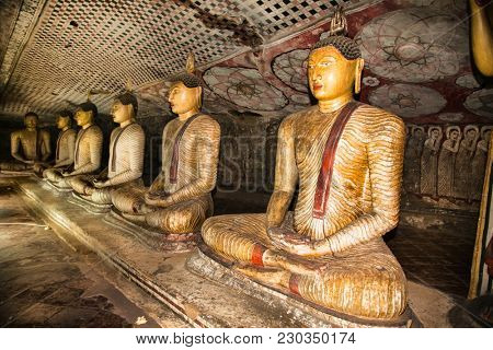 DAMBULLA SRI LANKA - DEC 27, 2016: Buddha statues inside Dambulla Cave Temple. Cave Temple is a World Heritage Site near Dambulla city on Dec 27, 2016. Sri Lanka.