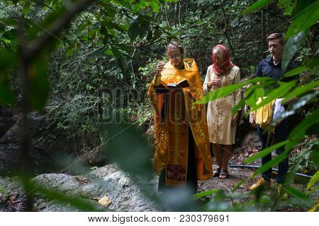 KOH CHANG, THAILAND - MAR 9, 2018: During Christian sacrament of spiritual birth - Baptism. There are currently 10 Orthodox parishes in Thailand, Orthodoxy is practiced by 0.002% of population.