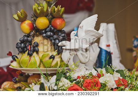 Densely Laden With Dishes Of The Table.