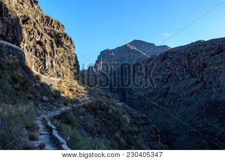 Irrigational Canal In Picturesque Rural Area With Open Watergate