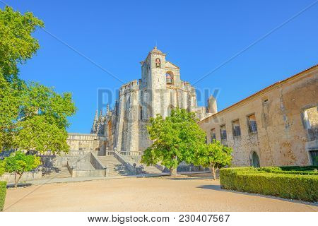 Church Of Convent Of Christ Or Convento Dos Cavaleiros De Cristo, In Tomar, Portugal. Sunny Day, Blu