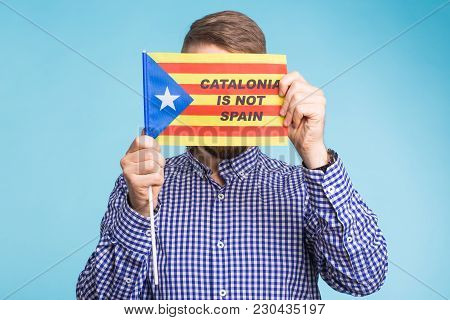 Man With Pro-independence Flag. Referendum For The Separation Of Catalonia From Spain Concept.