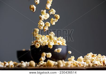 Levitating Popcorn Around A Ceramic Bowl.
