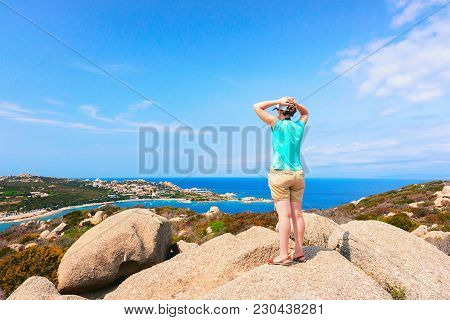 Girl Looking At The Panorama Of Capo Testa, Santa Teresa Gallura, Sardinia, Italy