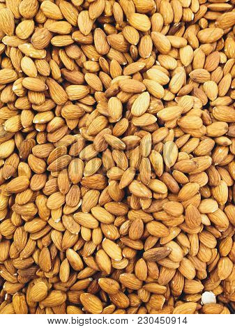 Closeup Shot Of Whole Almond Nuts For Background.