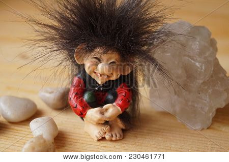 A Troll Cute With A Salt Crystal And Stones