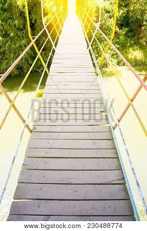 Image Of Suspension Bridge Across A River