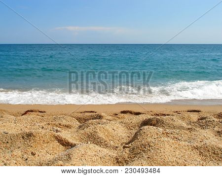Warm Summer Sea And Waves. Sand Beach.
