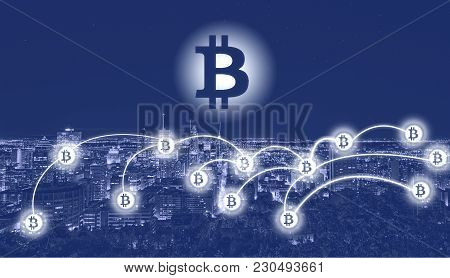 Bitcoin And Blockchain Technology Concept. Bitcoin Sign On Background Of Montreal City. Bitcoin Netw