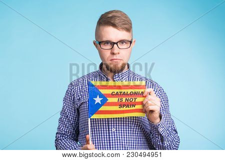 Man With Pro-independence Flag. Referendum For The Separation Of Catalonia From Spain Concept.