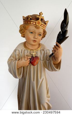 SISAK, CROATIA - DECEMBER 07: Infant Jesus, king of the world with sacred heart, statue in the Church of Visitation of the Virgin Mary in Sisak, Croatia, on December 07, 2017.