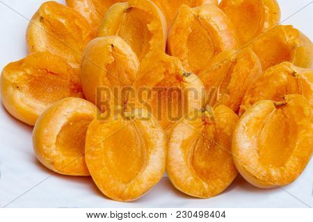 Peeled Apricot On A Plate. Peeled Fresh Apricot On A White Plate Without Pits. Healthy And Natural F