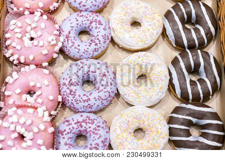 Donut. Sweet Icing Sugar Food. Dessert Colorful Snack. Glazed Sprinkles. Treat From Delicious Pastry