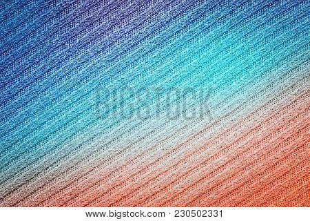 Gradient Color Textile Background From Purl And Face Loops, Diagonal Composition. Copy Space.