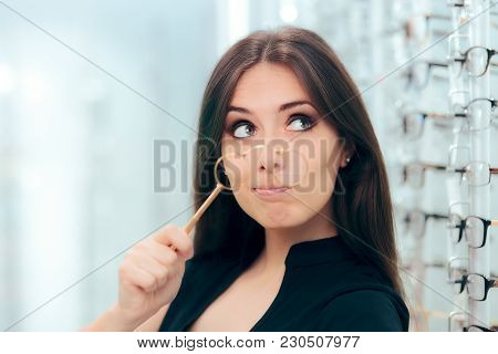Woman Looking To Replace Old Lorgnette Glasses With New Pair