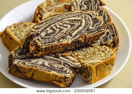 Homemade Roll With Poppy And Sweets With Nuts