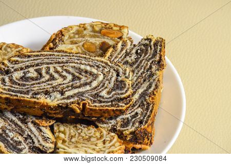 Homemade Roll With Poppy And Sweets With Nuts