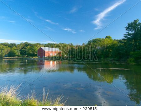Red Barn On A Lake
