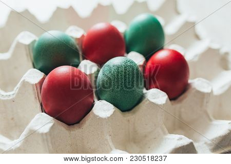 Easter Eggs Of Different Colors In Tray Background