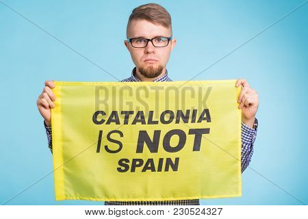 Man With Pro-independence Flag. Referendum For The Separation Of Catalonia From Spain Concept.