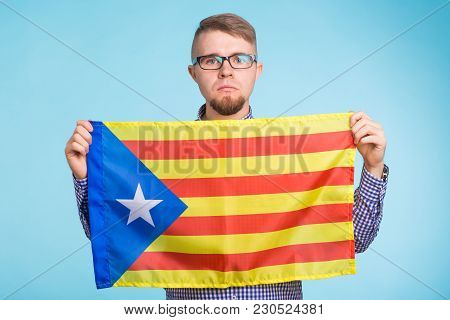 Man With Pro-independence Flag. Referendum For The Separation Of Catalonia From Spain Concept.