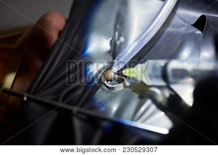 Close-up Of Operation Install Dental Implant Teeth Of Patient In Clinic Dark Office With Modern Tool