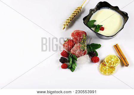 Frozen Raspberry, Berry, Strawberries, Yoghurt Plate, Mint Leaves, Slices Of Lemon, Apple, Wheat, On