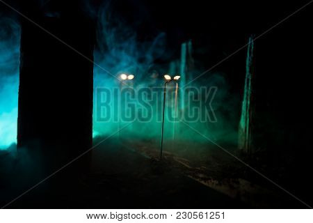 Empty Street Of Burnt Up City, Flames On The Ground And Blasts With Smoke In The Distance. Apocalypt