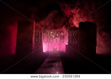 Empty Street Of Burnt Up City, Flames On The Ground And Blasts With Smoke In The Distance. Apocalypt