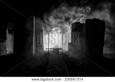 Empty Street Of Burnt Up City, Flames On The Ground And Blasts With Smoke In The Distance. Apocalypt