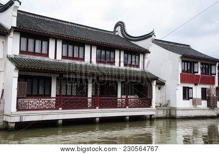Classical Chinese Architecture And Buildings Lining The Water Canals Of Zhaojialou Town In Shanghai 