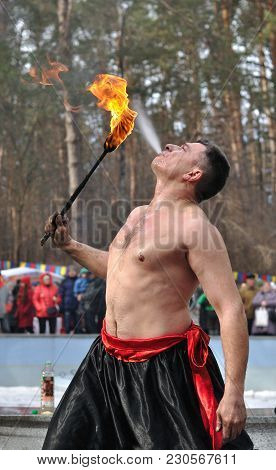 Cherkasy, Ukraine - February 25: Unidentified Male ( Fakir,master) Demonstrate Fire-breathing ,stree