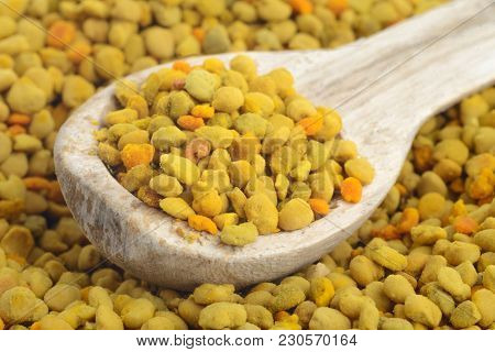 Flower Bee Pollen And A Wooden Spoon. Natural Remedy For Immunity Enhancement. Beekeeping Products. 