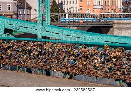 Wroclaw, Poland - March 9, 2018: View Of Symbolic Love Padlocks Fixed To The Railings Of Grunwaldzki