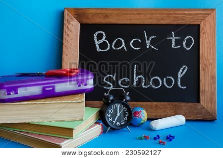 Back To School Concept With Stationery. School Supplies On Blue Background. Frase Back To School Wri