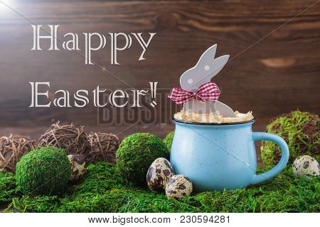 Wooden Polka Dot Grey Rabbit In A Blue Cup On The Grass Background, Easter Postcard Concept, Toned