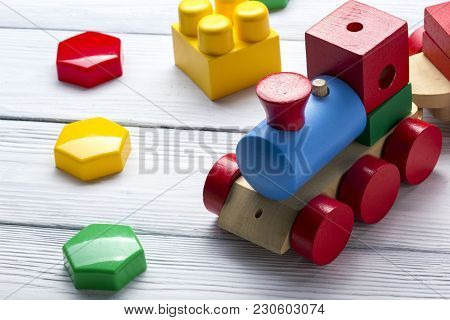 Kids Educational Developing Toys Frame On White Background. Top View. Flat Lay. Copy Space For Text.