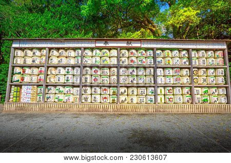 Kamakura, Japan - April 23, 2017: A Lot Of Japanese Sake Rice Wine Barrels With Decorative Writing I