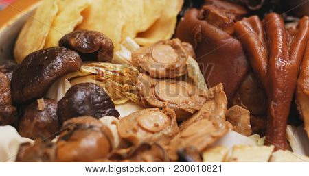 Eating Poon Choi together at home, Chinese cuisine fro lunar new year 