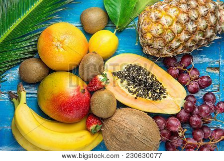 Ripe Juicy Tropical Summer Seasonal Fruits Mango Papaya Pineapple Coconut Kiwi Bananas Strawberries 
