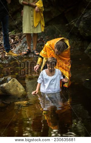 KOH CHANG, THAILAND - MAR 9, 2018: During Christian sacrament of spiritual birth - Baptism. There are currently 10 Orthodox parishes in Thailand, Orthodoxy is practiced by 0.002% of population.