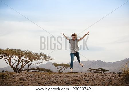 Girl Have Fun In Desert In A Summer Day