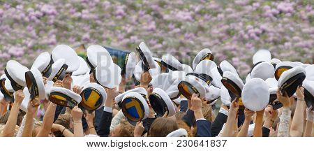 Stockholm, Sweden - Jun 13, 2017: Happy Swedish Graduating Students In A Beautiful Park With Lilac F
