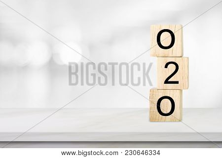 Online To Offline, O2o, On Wooden Cube Over Blur Background With Copy Space, Marketing Business Conc